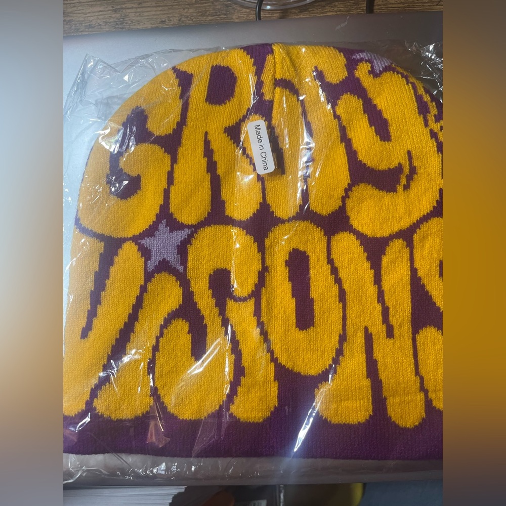 Purple and yellow “GRvTy ViSiONS” Graphic Beanie